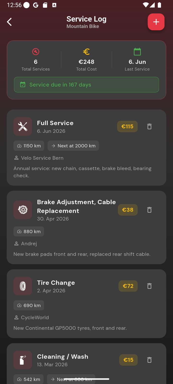 Service log screen showing a bike's full maintenance history with costs, mileage and reminders